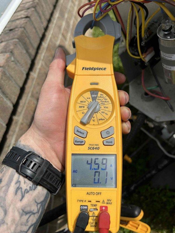 Completed monthly spring/summer preventive maintenance on heat pump and air handler system located in attic accessible through garage. Inspected electrical components including contactor and dual-run capacitor (TRCFD355), verified capacitance readings at 45.9 MFD using calibrated multimeter, confirmed all wire connections secure, and documented system operating within normal parameters.