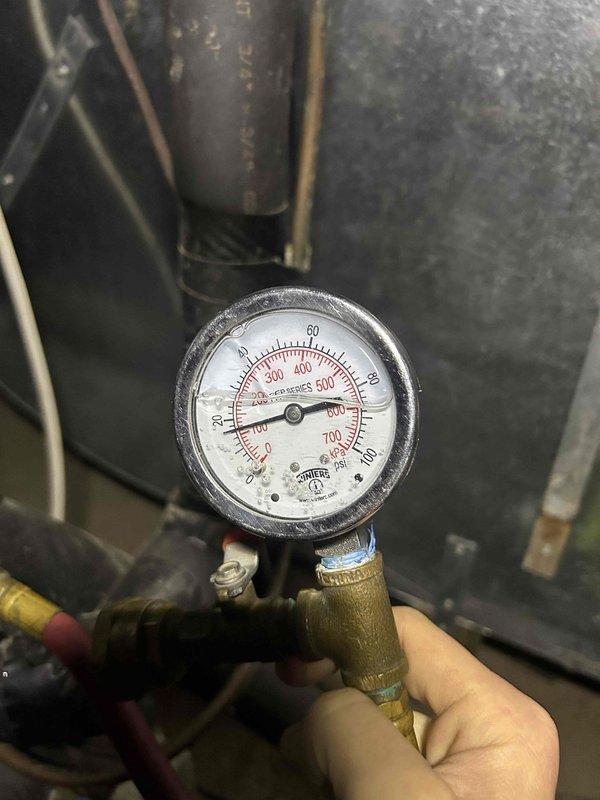 Completed Gold Level prepaid maintenance on dual geothermal system including one geo split with air handler, one geothermal unit, and one humidifier with #35 washable pad filter. Performed diagnostic testing with digital temperature measurement device reading 283.4°F and pressure gauge readings to verify proper system operation and refrigerant levels. All equipment inspected, tested, and confirmed operational within manufacturer specifications.