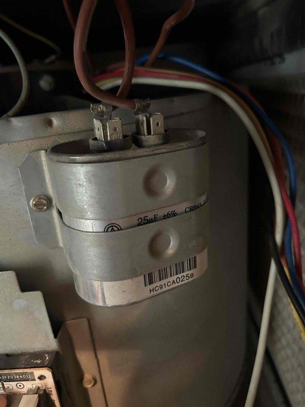 Completed routine AC tune-up maintenance on a 12-year-old cooling system located in the attic. Performed standard system diagnostics, verified capacitor specifications at 25µF, and measured supply air temperature at 58°F at the ductwork. All components inspected and found operating within normal parameters; system is functioning properly with no issues identified.