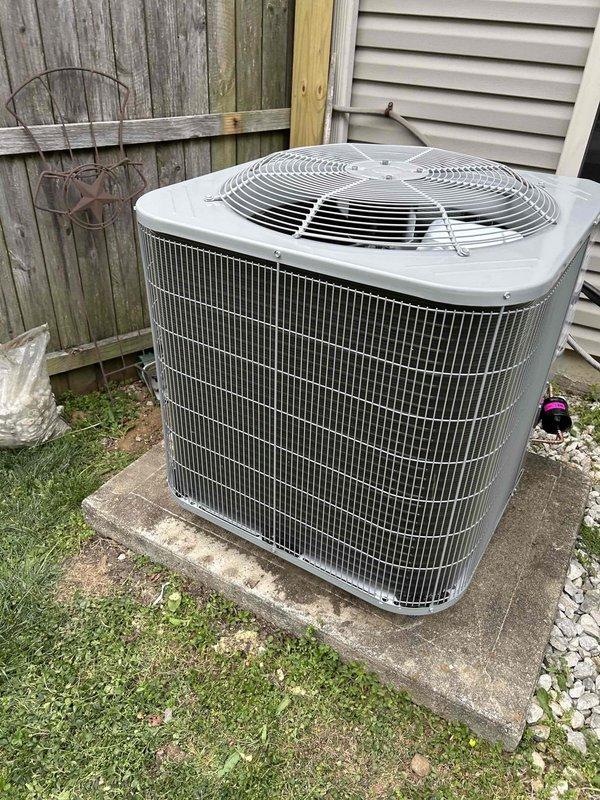 Successfully completed installation of a Bryant 15.2 SEER2 3-ton heat pump system with matching air handler and 15KW heat kit for second floor zone. Installed outdoor condenser unit on concrete pad with snow legs, electrical disconnect box, and whip kit, then ran insulated refrigerant lines with filter to indoor air handler. Mounted air handler with overflow drain pan equipped with water sensor, coil drain safety sensor, and proper trap, then integrated 20x30 filter return grille to replace existing undersized 20x25 grille and transitioned to existing ductwork. Installed digital WiFi thermostat for remote system control and monitoring. Removed and disposed of all existing equipment, obtained necessary permits, and verified system operation with proper refrigerant charge and airflow. System is now providing efficient heating and cooling with enhanced safety features and code-compliant installation.