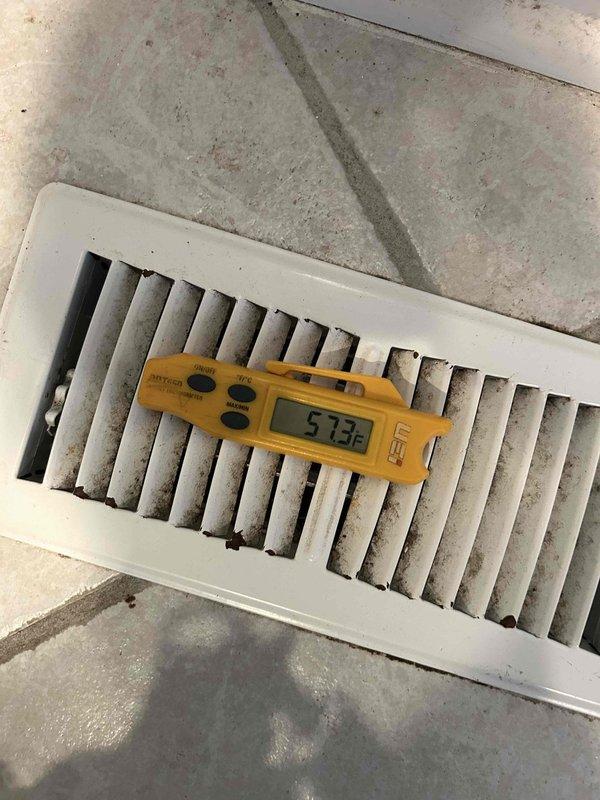 # HVAC Cooling System Diagnostic and Repair

Responded to service call for 12+ year old Bryant cooling system with complaint of outdoor compressor not activating while indoor air handler continued to operate. Upon arrival, performed initial system assessment and temperature readings at supply register, which measured 51.3°F, indicating insufficient cooling performance.

Conducted comprehensive diagnostic evaluation of electrical and control systems. Inspected indoor air handler control panel and identified issues with low voltage control wiring and connections. Examined thermostat circuit, contactor operation, and associated control components including gas valve assembly and safety controls within the air handler cabinet.

Traced low voltage wiring from indoor unit to outdoor condensing unit to isolate failure point preventing compressor engagement. Verified proper voltage at thermostat and indoor control board. Testing revealed faulty or interrupted signal to outdoor unit preventing 