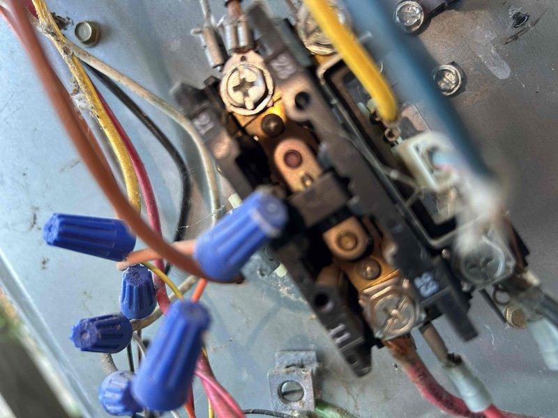 # HVAC Cooling System Diagnostic and Repair

Responded to service call for 12+ year old Bryant cooling system with complaint of outdoor compressor not activating while indoor air handler continued to operate. Upon arrival, performed initial system assessment and temperature readings at supply register, which measured 51.3°F, indicating insufficient cooling performance.

Conducted comprehensive diagnostic evaluation of electrical and control systems. Inspected indoor air handler control panel and identified issues with low voltage control wiring and connections. Examined thermostat circuit, contactor operation, and associated control components including gas valve assembly and safety controls within the air handler cabinet.

Traced low voltage wiring from indoor unit to outdoor condensing unit to isolate failure point preventing compressor engagement. Verified proper voltage at thermostat and indoor control board. Testing revealed faulty or interrupted signal to outdoor unit preventing 