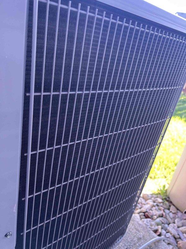 Completed comprehensive care plan tune-up on heat pump and air handler system installed in 2023, with equipment located in crawlspace. Performed standard maintenance procedures including inspection of outdoor condenser unit, which was found in good operating condition with clean coil fins and properly functioning components. Customer will provide their own air filters for the system, and noted that property's mini-split unit is not covered under current care plan membership.