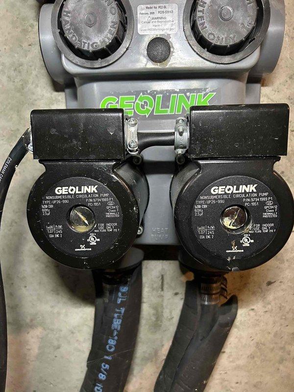 Completed Care Plan tune-up on geothermal heat pump system with dual GEOLINK circulation pumps located in basement. Inspected and tested both circulation pumps, verified proper operation of pump controls, and measured system pressures using calibrated gauge to ensure geothermal loop is within manufacturer specifications.