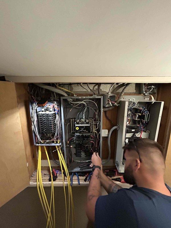Completed electrical installation of new Generac backup generator system at residential property. Relocated existing generator unit and installed new generator on gravel pad with proper grounding and conduit connections. Performed all electrical panel integration work, including breaker installation, load center wiring, and transfer switch connections to ensure seamless automatic power transfer during utility outages. Verified all electrical connections meet code requirements and tested system operation for proper functionality.