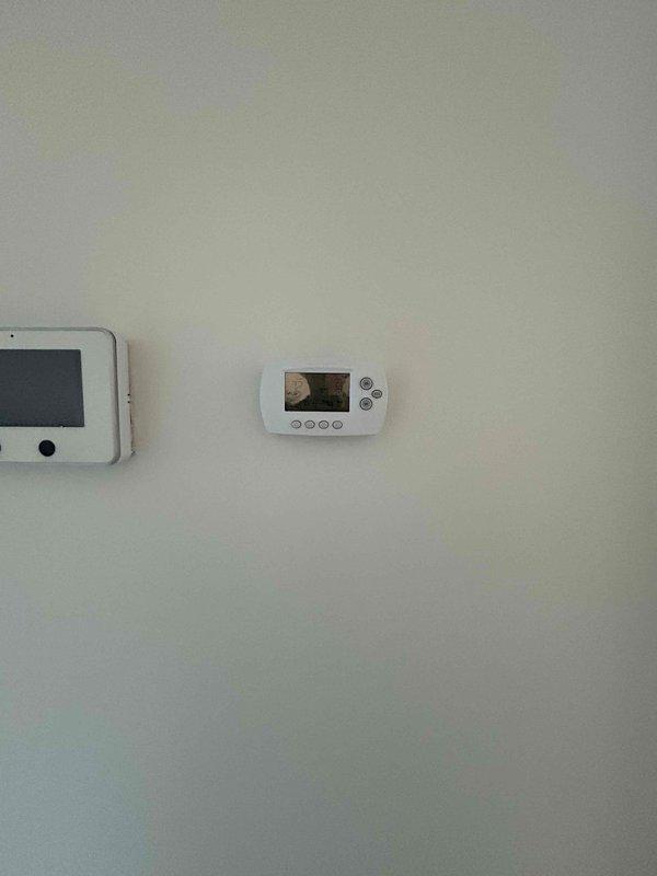 Completed comprehensive Care Plan tune-up service on an 8-year-old heat pump system with air handler located in attic. Performed full system diagnostics including electrical testing at outdoor condenser unit, verified thermostat operation and programming, inspected both indoor and outdoor equipment components, and confirmed proper system performance per manufacturer specifications.