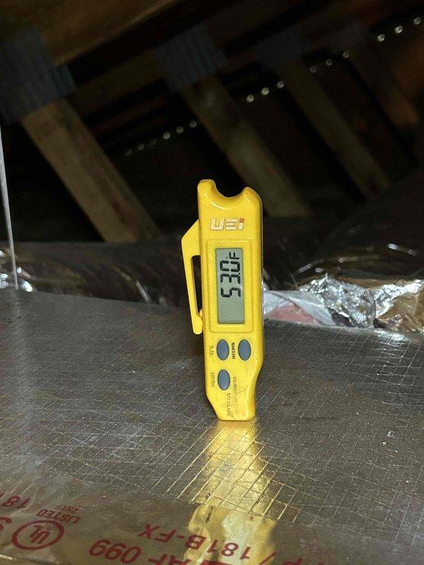 Performed maintenance tune-up on Rheem gas furnace system located in attic space, addressing customer concerns regarding intermittent musty odors from supply vents. Conducted comprehensive system inspection including temperature differential measurements across supply and return air streams, recording supply air temperature of 63.8°F and temperature rise of 32.5°F, confirming proper heat exchanger operation and combustion efficiency. Inspected ductwork, insulation, and attic air handler installation for moisture intrusion, microbial growth, or condensation issues that could contribute to odor concerns; recommended monitoring system performance and consideration of duct cleaning or UV light installation if odors persist.
