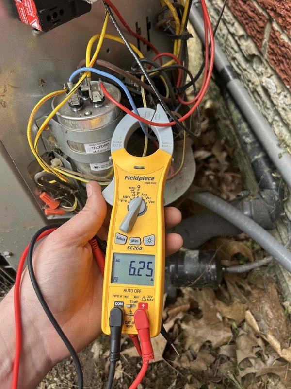 Completed preventive maintenance tune-up on air conditioning system and gas furnace unit located in crawl space as part of care plan service. Installed customer-supplied 20x25x4 air filter and performed comprehensive system inspection, including electrical diagnostics with amperage readings confirming proper compressor operation at 62.5 amps and capacitor functionality verification.