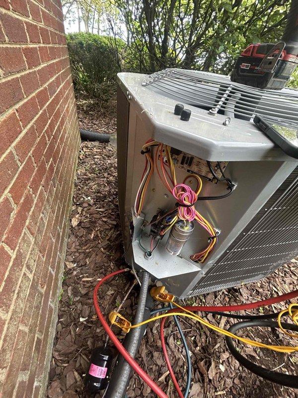 Completed comprehensive Care Plan tune-up on heat pump and air handler system located in attic. Performed diagnostic testing on outdoor condenser unit using digital multimeter to verify electrical performance and system operation. Inspected internal electrical components, wiring connections, and refrigerant line system including copper tubing and service lines. Provided additional air filters as requested (16x25x1 and 20x25x4 sizes) to supplement customer-supplied filters for ongoing maintenance.