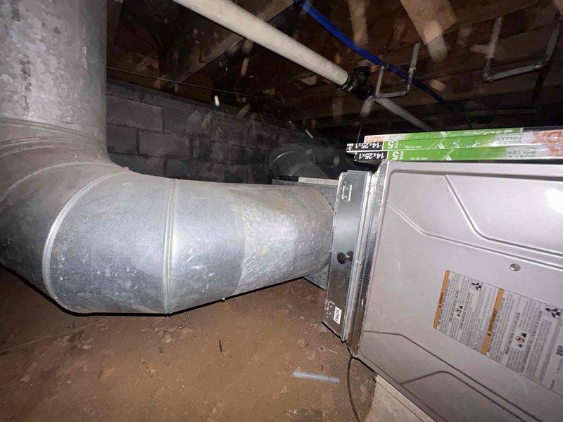 Completed annual Care Plan tune-up for air conditioning and gas furnace system located in crawlspace. Performed comprehensive inspection and maintenance of HVAC equipment, including temperature diagnostics showing 90.6°F readings at supply plenum. Customer provided filters (14x25x1) for replacement as part of routine maintenance protocol.