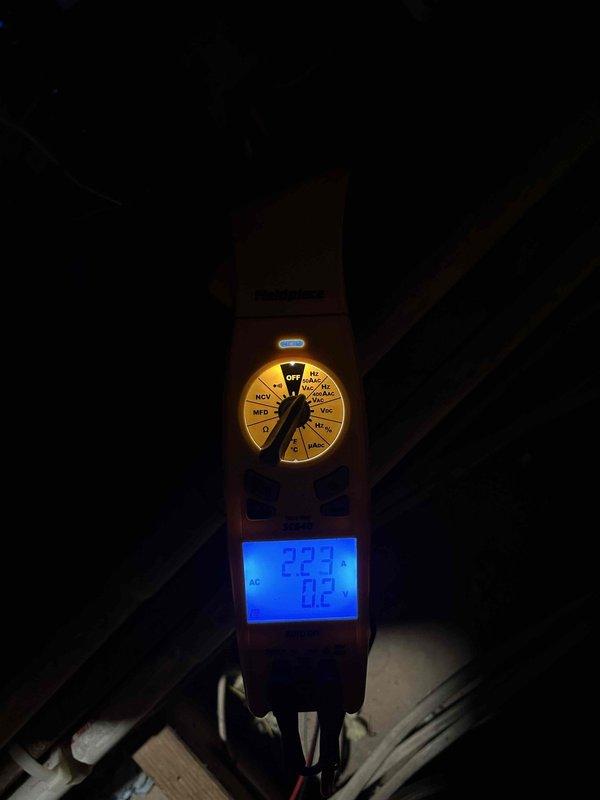 Completed routine AC tune-up on attic-mounted air handler/gas furnace unit located above garage. Inspected and tested dual-run capacitor (TRCFD455, 440/370VAC), verified proper electrical connections and voltage readings at 227VAC, confirmed all compressor and fan motor circuits functioning within normal parameters. Customer provides their own filter for unit maintenance.