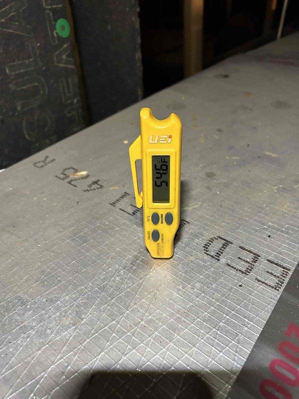 Completed club single maintenance on a 2-year-old system with indoor unit located in attic. Performed standard diagnostic measurements including temperature and electrical readings using digital meters, verified system amperage at 5.72A, and conducted visual inspection of capacitor and electrical connections. All components found operating within normal parameters during basic hands-off maintenance service.