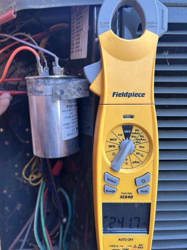 Completed annual air conditioning maintenance as part of club membership plan. Performed electrical diagnostics on outdoor condensing unit, measuring voltage at 241.7V and amperage readings of 5.884A with Fieldpiece clamp meter. Tested capacitor functionality and verified all electrical connections were secure. Changed customer-provided filter as requested. All system components operating within normal parameters upon completion of tune-up service.