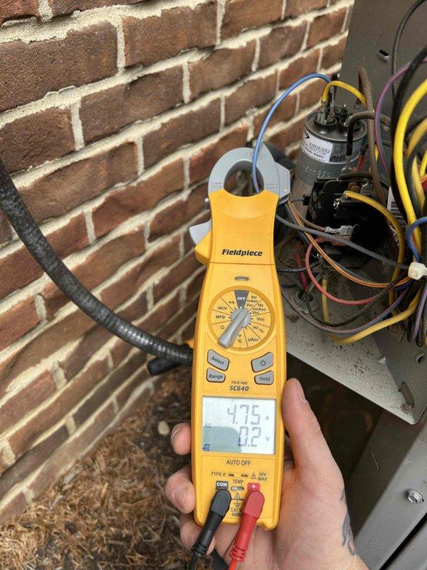 Performed scheduled Care Plan maintenance on air conditioning system and gas furnace. Completed comprehensive tune-up including electrical diagnostics with amp and voltage readings on outdoor unit components. Verified capacitor operation and measured system performance parameters. Checked humidifier as requested during visit. System operating within normal specifications upon completion of maintenance procedures.