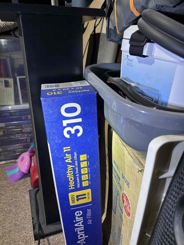 Completed comprehensive care plan tune-up on a 10-year-old heat pump air handler system located in basement utility closet. Accessed unit for full inspection, verified electrical components including capacitor and contactor operation, checked all wire connections and terminations, inspected heat exchanger coil condition, and assessed overall system functionality. Documented equipment condition with photos showing internal components and confirmed air filter availability on-site for proper system maintenance.
