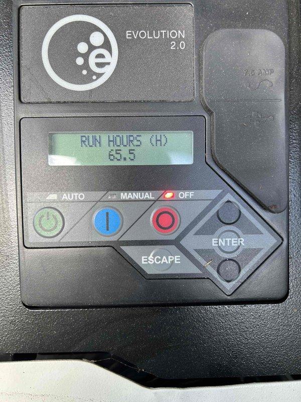 Completed scheduled maintenance on Generac Evolution 2.0 standby generator with 65.5 run hours. Performed routine inspection of unit and transfer switch, applied required maintenance stickers to both generator and transfer switch as specified, verified control panel functionality with AUTO/MANUAL/OFF modes operational, and documented equipment condition with photos while customer was available by phone for coordination.