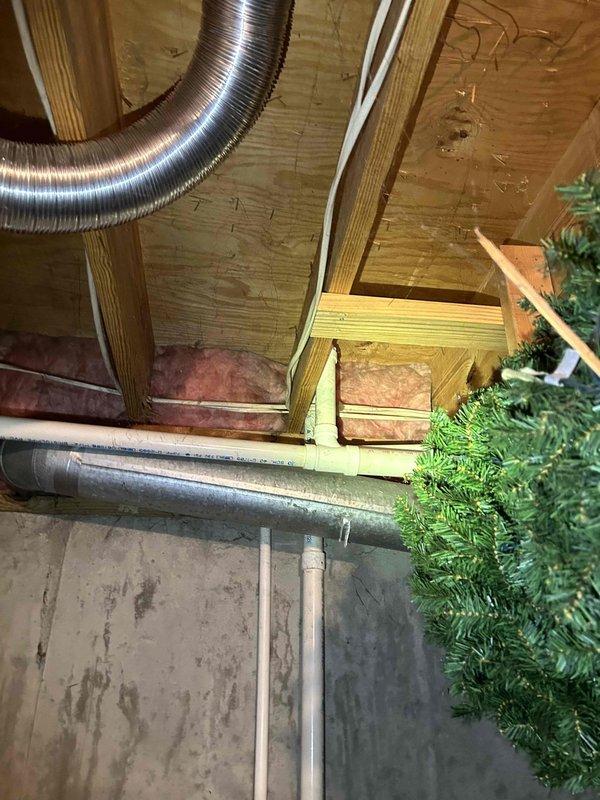 Conducted on-site assessment for sump pump relocation in basement utility area as requested by LFUCG. Evaluated existing conditions including concrete foundation with visible moisture staining, current plumbing infrastructure with PVC drainage lines, exposed floor joists, and HVAC ductwork routing. Documented existing sump pump location and surrounding mechanical systems to prepare comprehensive estimate for relocating unit to optimal position for improved drainage performance and accessibility. Estimate documentation forwarded to homeowner and municipal contact for review and approval.