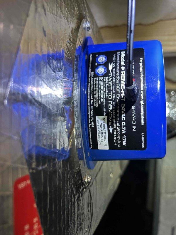 Completed installation of two REME HALO in-duct air purification systems into the existing HVAC ductwork. Both units were properly mounted, secured to the supply plenum, and verified for correct positioning to ensure optimal whole-home air purification through ionized hydroperoxide technology.