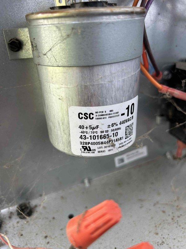Completed preventive maintenance tune-up on air conditioning system per care plan agreement. Performed comprehensive system inspection including electrical diagnostics with clamp meter, recording amperage draw of 7.1A and voltage reading of 22V at condenser unit. Inspected dual-run capacitor rated at 40+5µF 440VAC, verified proper electrical connections, and confirmed all components operating within manufacturer specifications.