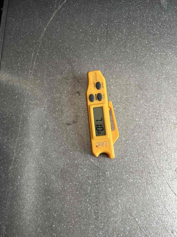 Responded to no cooling complaint on five-year-old air conditioning system blowing warm air. Upon arrival, performed diagnostic testing using digital thermometer to measure supply air temperature, which registered 589°F on ductwork surface, indicating abnormal heating condition. Conducted systematic troubleshooting of the unit to identify root cause of warm air discharge and lack of cooling capacity.
