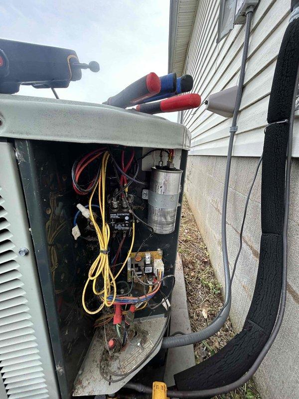 Responded to no cooling complaint with indoor temperature reading 3 degrees above setpoint. Upon inspection of outdoor condensing unit, found heavily corroded compressor motor with significant deterioration of internal components, extensive debris accumulation restricting airflow, and aged electrical connections showing weathering. Unit exhibited advanced oxidation throughout, compromised wiring insulation, and organic matter buildup on refrigerant lines and internal surfaces. Due to severe component degradation and age-related failure of compressor assembly, recommended complete system replacement as repair would not be economically feasible given the extent of corrosion and mechanical deterioration present.