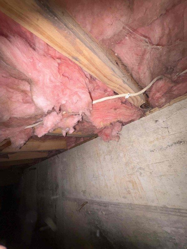 Responded to service call for two exterior hose bibs requiring stem replacement. Accessed plumbing infrastructure through crawl space to assess water supply lines and shutoff valves. Inspected copper supply piping and verified proper insulation coverage in exposed areas. Replaced worn compression stems on both outdoor faucets—one mounted on rear exterior wall and one on side of structure. Tested both fixtures for proper operation, verified shutoff capability, and confirmed no residual dripping or leakage. All work completed to code specifications.