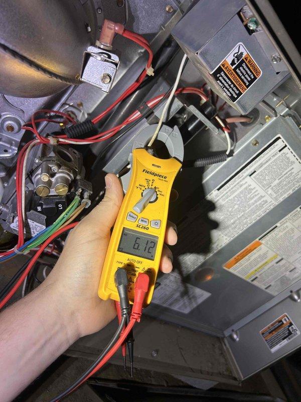 Completed Gold Level preventive maintenance inspection on single HVAC system in basement installation. Performed comprehensive electrical diagnostics on both outdoor condensing unit and indoor air handler components using calibrated testing equipment. Measured and verified voltage readings at contactor and blower motor circuits, confirming proper electrical operation across all system components. Customer provided 16x25x1 filter for installation. All electrical connections inspected and found secure with no signs of overheating or deterioration. System operating within normal parameters upon completion of maintenance service.