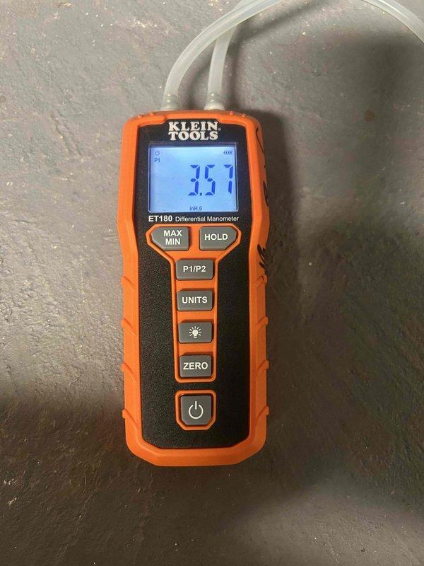 Completed Gold Level prepaid maintenance on dual-system residential HVAC installation with AC units and gas furnaces located in attic and basement. Performed comprehensive system diagnostics including differential pressure measurements using manometer, which indicated 35.7 inches of water column, and refrigerant pressure testing with manifold gauges on outdoor condensing units. Customer provided 16x25x4 air filters for both systems during service visit.