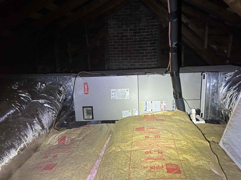 Responded to no cooling complaint on 6-year-old electric HVAC system located in upstairs attic space. Upon arrival, found Bryant air handler unit with thermostat displaying 73°F in off mode with "Following Schedule" status. Performed diagnostic evaluation of the system including inspection of air handler components, refrigerant lines, electrical connections, and ductwork. Verified thermostat programming and system operation settings. Air filter had been changed recently per homeowner. Conducted comprehensive assessment of cooling system performance and identified root cause of no cooling condition. Made necessary adjustments and repairs to restore proper system operation and cooling functionality.