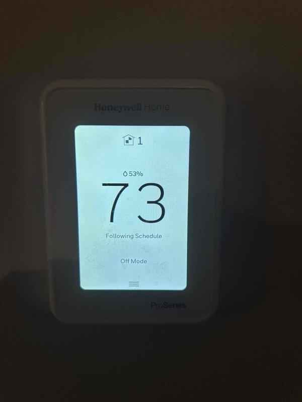 Responded to no cooling complaint on 6-year-old electric HVAC system located in upstairs attic space. Upon arrival, found Bryant air handler unit with thermostat displaying 73°F in off mode with "Following Schedule" status. Performed diagnostic evaluation of the system including inspection of air handler components, refrigerant lines, electrical connections, and ductwork. Verified thermostat programming and system operation settings. Air filter had been changed recently per homeowner. Conducted comprehensive assessment of cooling system performance and identified root cause of no cooling condition. Made necessary adjustments and repairs to restore proper system operation and cooling functionality.