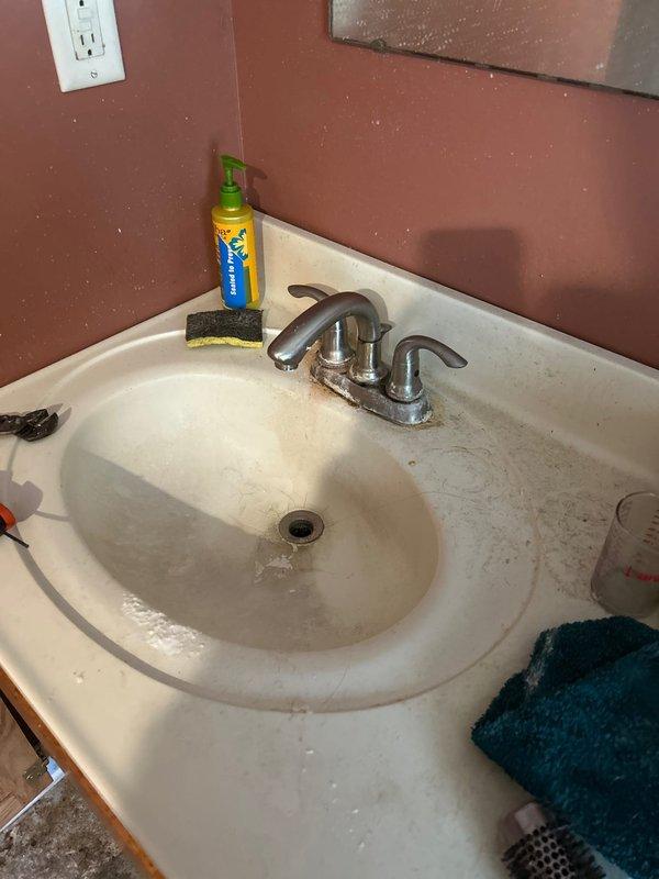 Completed return visit to address leaking Delta shower cartridge and install new lavatory sink strainer. Replaced faulty shower cartridge to eliminate leak. Installed chrome-plated lavatory strainer assembly with new tailpiece connection to existing P-trap configuration under bathroom sink. Verified proper drainage and tested all connections for leaks. Both repairs completed successfully.