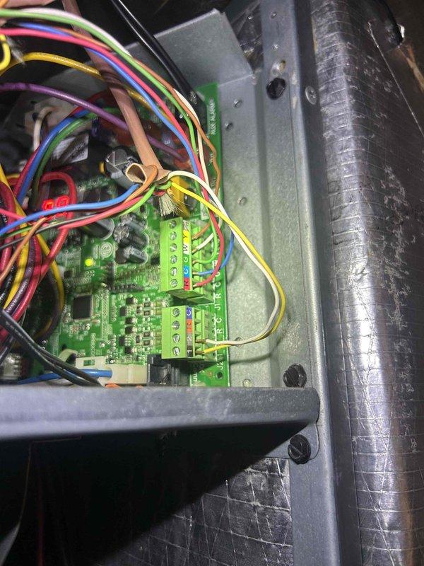 Responded to second opinion service call for 2.5-year-old heat pump system with complete loss of heating and cooling function for approximately two months. Upon arrival, performed comprehensive diagnostic evaluation of first-floor air handler and control systems. Inspected electrical control board and wiring connections, identifying intermittent failure in primary control circuit. Tested thermostat communication, verified proper voltage at terminal connections, and evaluated refrigerant pressures at both indoor and outdoor units. Examined condensate drainage system and confirmed proper airflow through recently changed filter. Documented control board condition and wiring configuration for ongoing intermittent fault analysis. System required further troubleshooting to isolate root cause of recurring failure that previous service provider was unable to resolve permanently.