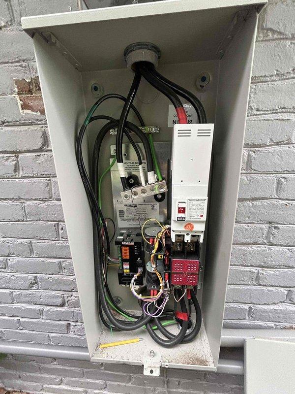 Completed preventive maintenance service on Generac standby generator unit. Performed comprehensive inspection of generator system including exterior housing, internal transfer switch components, and electrical connections. Verified proper operation of control module, circuit breakers, contactors, and wiring terminations within transfer switch enclosure. All electrical components found to be in satisfactory working condition with no immediate service requirements identified.