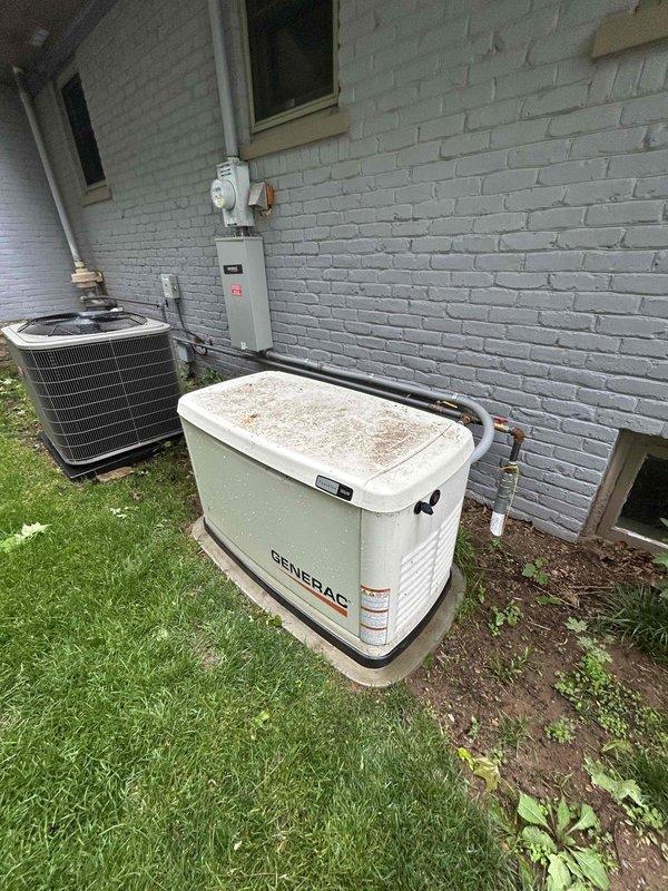 Completed preventive maintenance service on Generac standby generator unit. Performed comprehensive inspection of generator system including exterior housing, internal transfer switch components, and electrical connections. Verified proper operation of control module, circuit breakers, contactors, and wiring terminations within transfer switch enclosure. All electrical components found to be in satisfactory working condition with no immediate service requirements identified.