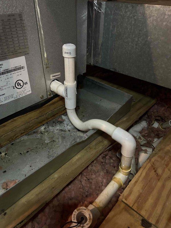 Replaced failed blower motor on upstairs air handling unit to restore proper airflow and system operation. Repaired leaking condensate drain line by replacing damaged PVC sections and fittings, ensuring proper drainage and preventing water damage to surrounding areas.