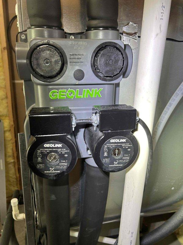 Completed annual maintenance tune-up on geothermal HVAC system with one ground loop and humidifier located in basement. Performed comprehensive inspection including electrical testing of system components, verified loop pressures on GEOLINK hydronic heating system and dual circulation pumps, inspected ground loop manifold assembly and connections, checked #35 pad and washable filter, and documented system operation with all parameters within normal operating range.