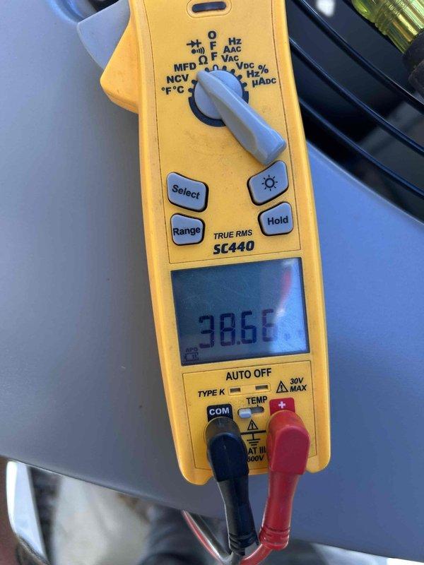 Completed comprehensive tune-up on 1.5-year-old heating equipment located in basement. Performed temperature diagnostics using precision testing equipment, recording operating temperature of 386°F, and conducted thorough inspection of electrical connections and wiring harnesses. Provided consultation regarding potential conversion from current system to gas heating equipment and recommended scheduling follow-up with sales specialist to discuss replacement options.