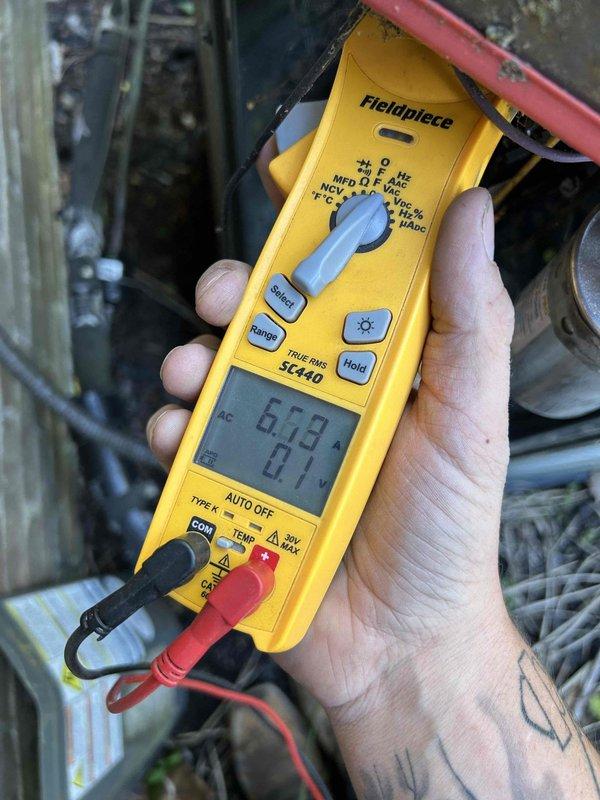 Completed comprehensive Care Plan tune-up on dual HVAC system with air conditioning units and gas furnaces over 10 years old, with equipment located in attic and basement. Performed full system diagnostics using calibrated test equipment, measuring electrical parameters including voltage readings of 100.4V and amperage draw of 6.79A to verify proper operation of both units. Conducted thorough inspection of all accessible components, checked refrigerant pressures, tested electrical connections, evaluated blower motor performance, and verified proper system cycling on both heating and cooling equipment to ensure optimal performance and efficiency.