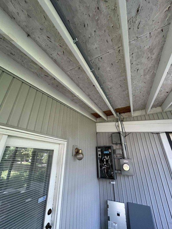 Removed existing electrical disconnect and installed a Kohler service entrance rated automatic transfer switch to enable seamless power transition between utility and backup generator sources. Installed a 50-amp generator inlet box with weather-resistant cover on exterior wall, ran appropriate gauge conductors through protective conduit to transfer switch, and completed all necessary terminations per manufacturer specifications and NEC requirements. Performed operational testing with generator to verify proper transfer switch functionality, correct phase rotation, and reliable power delivery to designated circuits.
