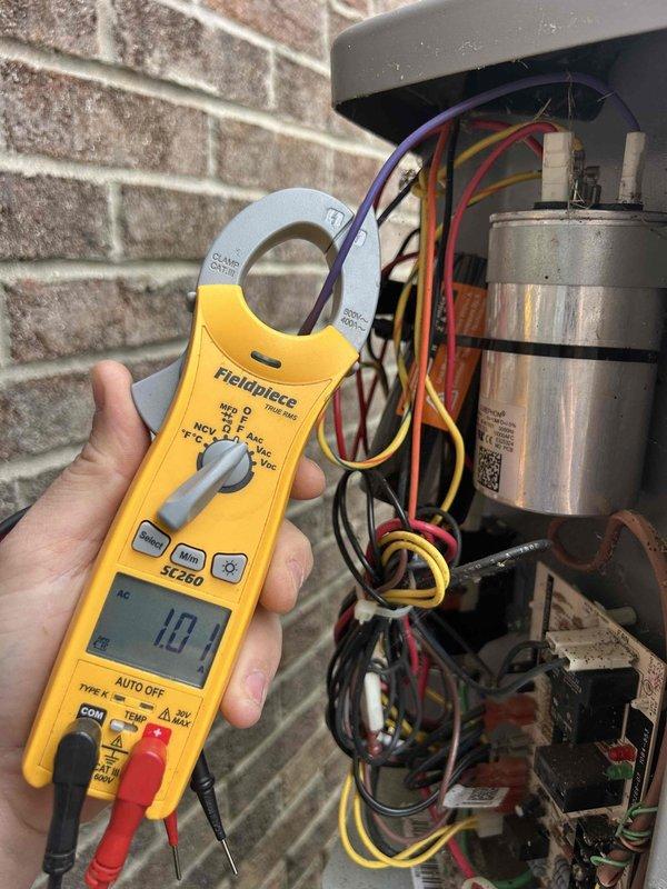 Completed Gold Care Plan Tune Up on residential HVAC system. Performed comprehensive system diagnostics including electrical measurements using clamp meter, which indicated 10.4 amp draw on compressor circuit. Inspected all major components including capacitor, wiring connections, and control board—all found to be in proper working condition. Verified thermostat operation and confirmed system settings with unit in off mode and fan set to auto at 65 degrees.