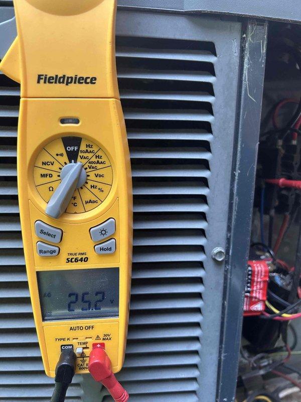 Completed annual care plan maintenance on air conditioning and gas furnace system located in basement. Performed comprehensive inspection of electrical components including capacitor testing, which measured 252 microfarads and showed normal operation. Verified R410A refrigerant specifications and assessed overall system condition, noting typical wear and dirt accumulation on outdoor unit components consistent with normal environmental exposure.