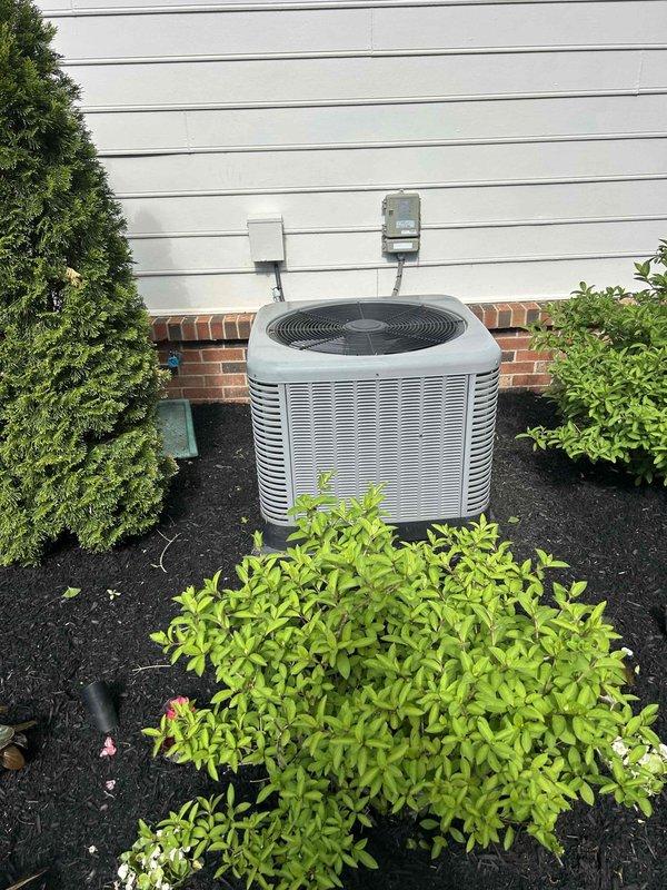 Completed annual Care Plan tune-up on residential air conditioning system with outdoor condenser unit and gas furnace located in crawlspace. Performed comprehensive maintenance inspection of AC condenser, verified proper operation of all components, and confirmed system performance. Customer-supplied 20x25x1 pleated air filter was inspected and documented during service visit.