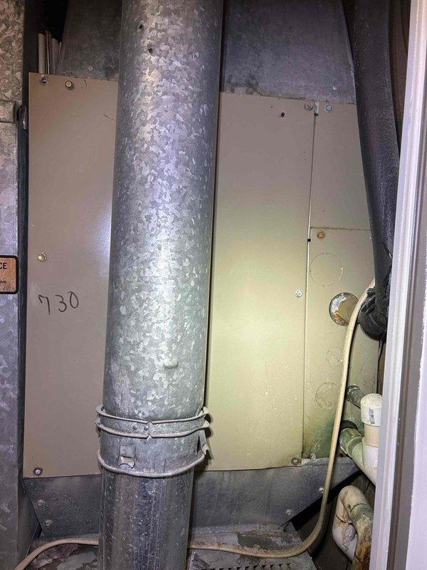 Responded to no heat call for 30+ year old electric AC/furnace system located in closet. Upon arrival, verified system was not operating with no tripped breakers at panel. Accessed indoor air handler unit and inspected electrical components, blower assembly, and control board. Checked supply air temperature at ceiling register using digital thermometer, which confirmed no heated air delivery. Performed diagnostic testing of thermostat communication, transformer voltage, and safety switch circuits. Documented equipment condition with photos showing age-related wear on ductwork connections and air handler cabinet. System requires further troubleshooting of control circuits and potential component replacement to restore heating operation.