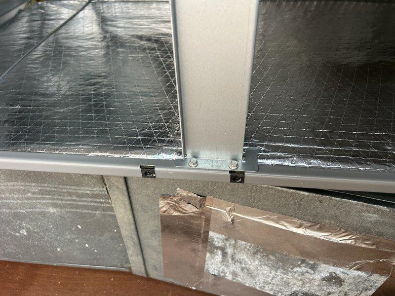 Responded to no cooling complaint on a 4-year-old electric HVAC system with water leakage at the indoor unit. Upon inspection, found evidence of ongoing drainage issues with wet filter condition and water accumulation at the air handler located in the garage. Performed diagnostic evaluation of the evaporator coil assembly and examined the condensate drain system to identify the root cause of the cooling failure and water leakage that had persisted for three days.