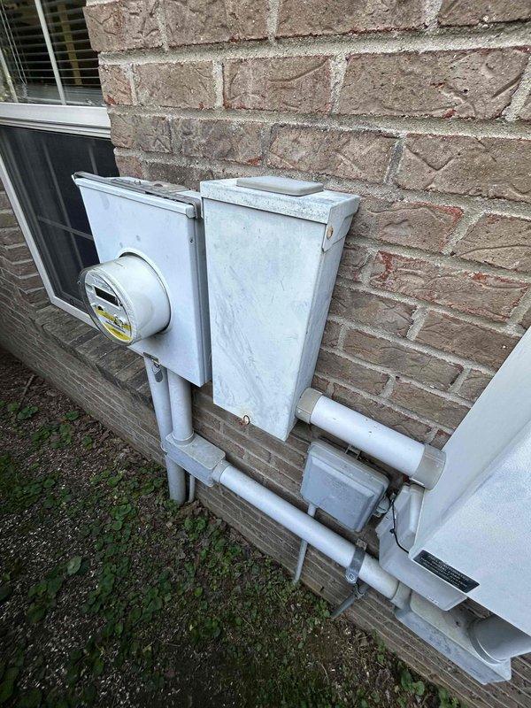 Completed scheduled maintenance on 20kW Generac standby generator system. Replaced battery, applied identification stickers to both generator unit and transfer switch per customer request, and performed standard maintenance inspection. All equipment operational and functioning within normal parameters.