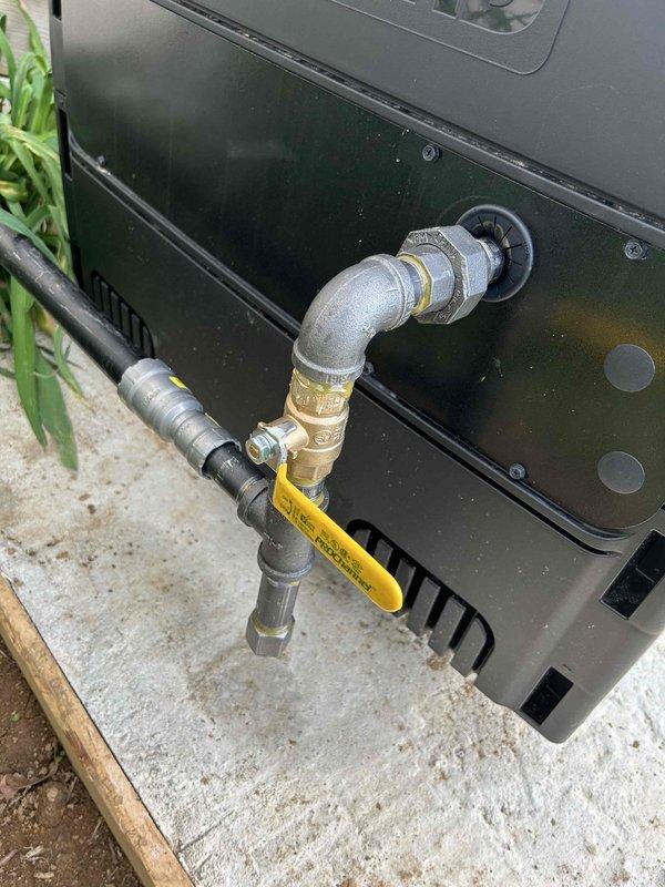 Completed installation of new propane gas line for pool heater by tapping into existing 3/4-inch gas line, upsizing to 1-inch, and running approximately 30 feet of new pipe through exterior wall to customer-provided pool heater. Hard-piped gas connection to heater unit with 3/4-inch sediment trap and shut-off valve installed immediately upstream of appliance. Verified all connections for gas leaks prior to completion; no leaks detected on newly installed gas line system.