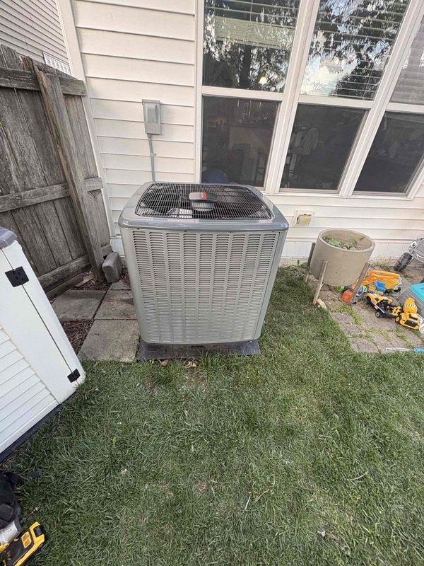 Completed full HVAC system replacement under Daikin warranty, including heat pump condenser unit, air handler, and heat kit installation. Removed existing failed equipment and installed new warranty replacement units in exterior side yard location. Documented all model and serial numbers of both old and new equipment with labeled photographs per warranty claim requirements for manufacturer processing.