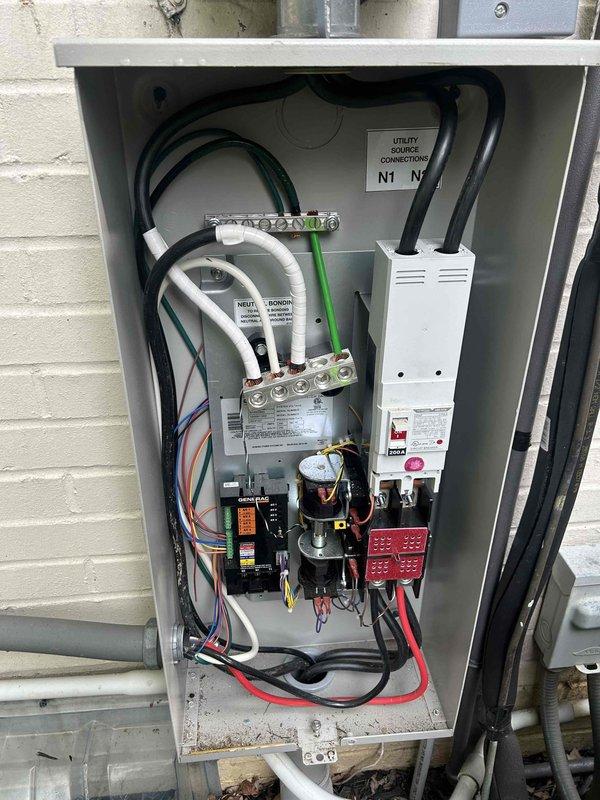 Completed comprehensive preventive maintenance service on Generac air-cooled standby generator. Performed full system inspection including fuel system verification, battery electrical testing, and high/low voltage connection testing of all electrical components. Replaced spark plugs, air filter, and oil filter per manufacturer specifications. Conducted thorough examination of generator enclosure interior and exterior, verified proper physical installation and mounting. Tested complete system operation in both manual and automatic modes under load to confirm proper transfer switch functionality and power delivery. All components found in good working condition with system performing to specifications.