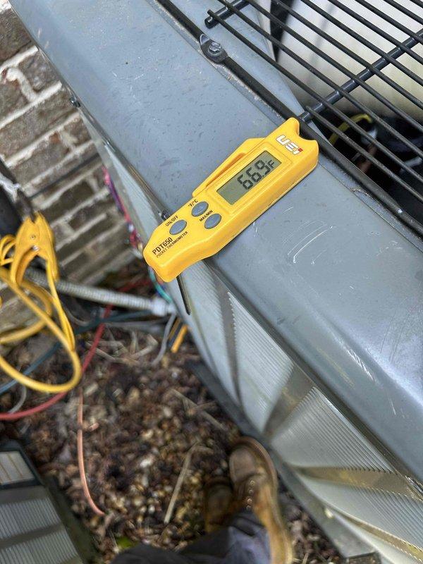 Responded to callback for HVAC system not operating following previous repairs completed on 4/27. Upon arrival, connected refrigerant manifold gauges to service ports and obtained system pressure readings. High-side pressure measured 237.8 PSIG while low-side pressure read 112 PSIG. Noted visible corrosion on copper refrigerant lines indicating potential long-term moisture exposure. Measured supply air temperature at unit discharge, which registered 66.8°F. Performed diagnostic testing to identify root cause of system failure and documented equipment conditions with photos for service records.