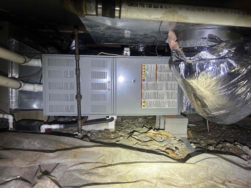 Performed comprehensive air conditioning maintenance tune-up on ground floor HVAC system located in crawl space as part of club membership plan. Inspected air handler unit, capacitor, control board components, condensate drain lines, and ductwork connections; verified all electrical connections secure and system operating within manufacturer specifications. Supplied and installed 20x20x1 air filter included with maintenance agreement.